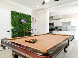Spacious 4BR Coastal Home with Pool Table Minutes from the Beach - Image 3